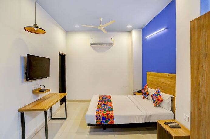 Imagen de la habitación del Hotel Fabhotel Grand Capitol. Foto 18