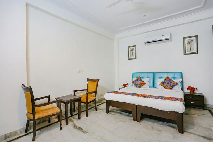 Imagen de la habitación del Hotel Fabhotel Grand Palace. Foto 20