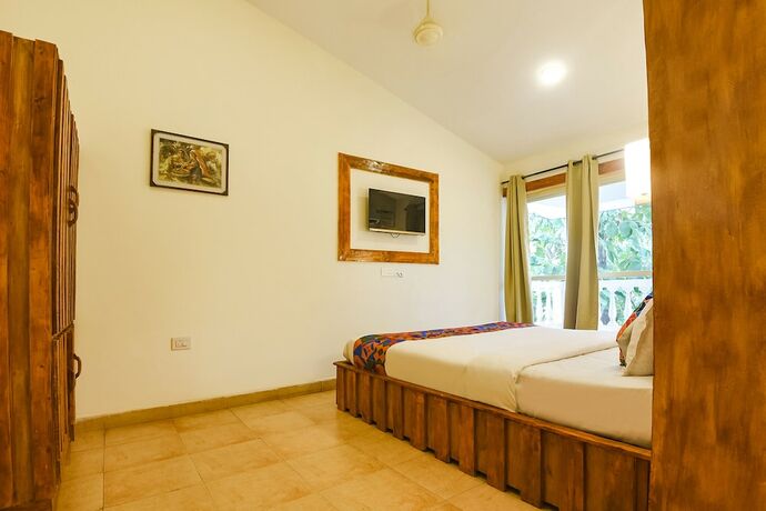 Imagen de la habitación del Hotel Fabhotel Grand Royal Palms. Foto 19
