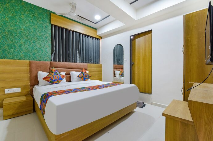 Imagen de la habitación del Hotel Fabhotel Green Tree. Foto 19