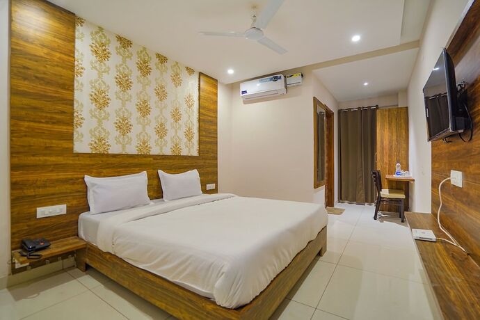 Imagen de la habitación del Hotel Fabhotel Hc Mohali Inn. Foto 17