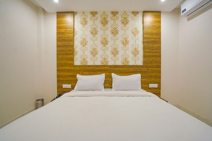 Imagen de la habitación del Hotel Fabhotel Hc Mohali Inn. Foto 18