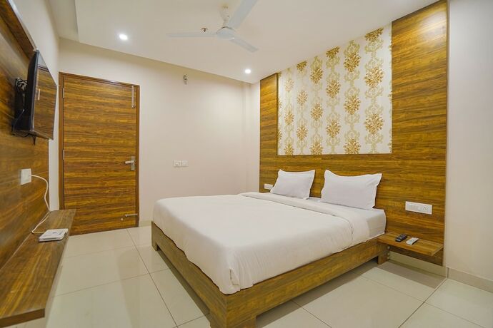Imagen de la habitación del Hotel Fabhotel Hc Mohali Inn. Foto 19
