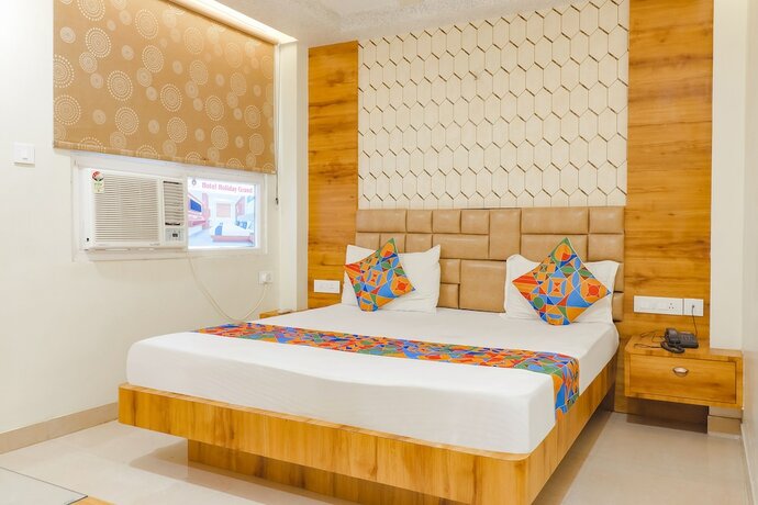 Imagen de la habitación del Hotel Fabhotel Holiday Grand. Foto 19