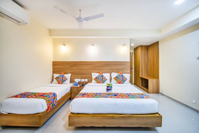 Imagen de la habitación del Hotel Fabhotel Jansi Deluxe Gandhipuram. Foto 17