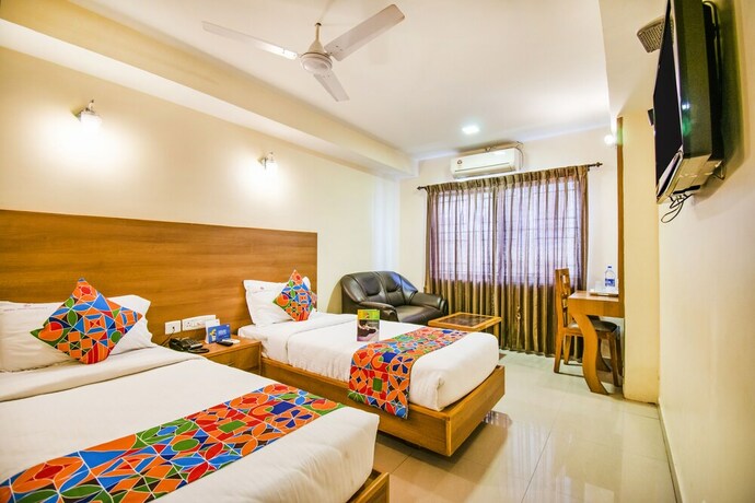 Imagen de la habitación del Hotel Fabhotel Jansi Deluxe Gandhipuram. Foto 18