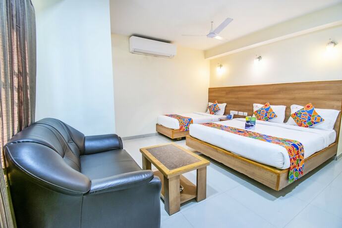 Imagen de la habitación del Hotel Fabhotel Jansi Deluxe Gandhipuram. Foto 20