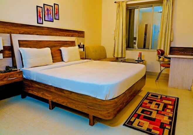 Imagen de la habitación del Hotel Fabhotel Kanchan Plaza. Foto 17