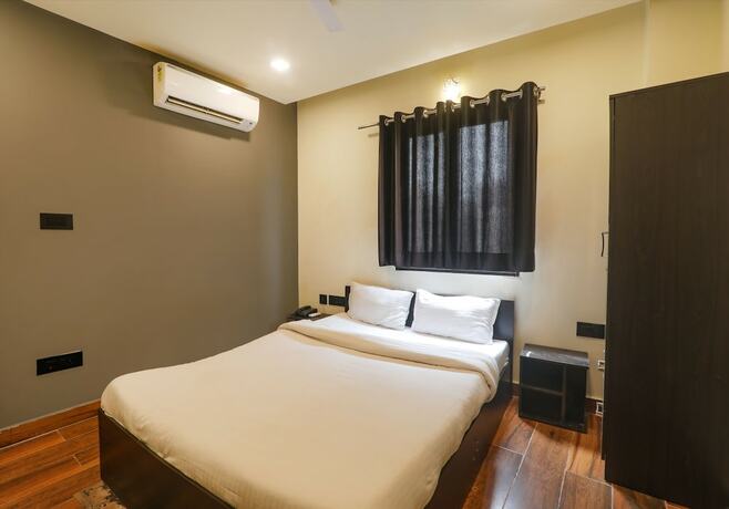Imagen de la habitación del Hotel Fabhotel Lemon Grass. Foto 19