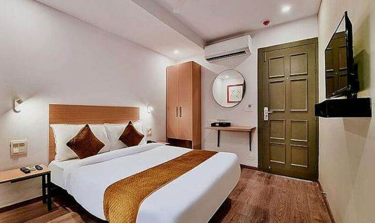 Imagen de la habitación del Hotel Fabhotel Lupin International. Foto 9