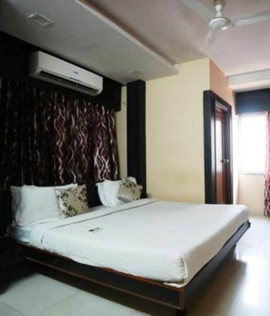 Imagen de la habitación del Hotel Fabhotel Madurai. Foto 15