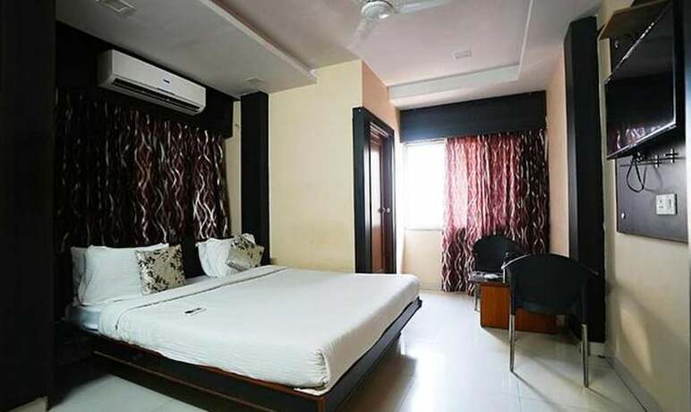 Imagen de la habitación del Hotel Fabhotel Madurai. Foto 16