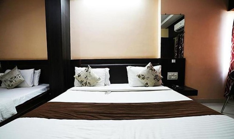 Imagen de la habitación del Hotel Fabhotel Madurai. Foto 17