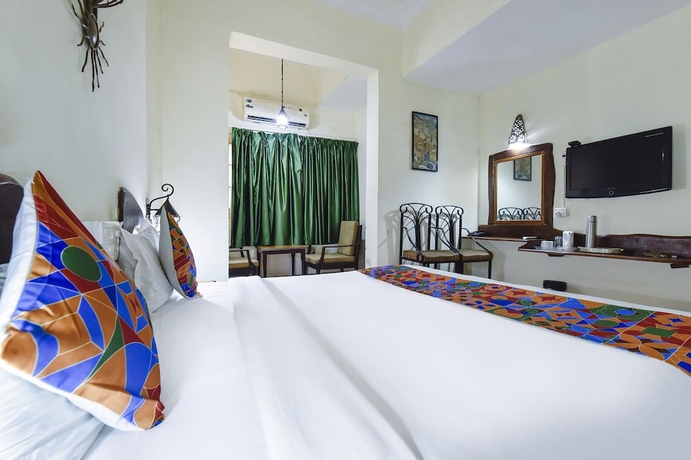 Imagen de la habitación del Hotel Fabhotel Maharaja. Foto 7