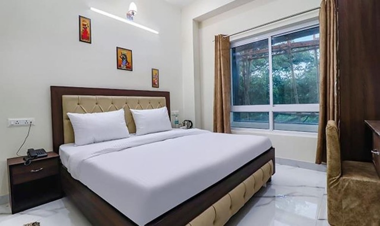 Imagen de la habitación del Hotel Fabhotel Maira Heights. Foto 19