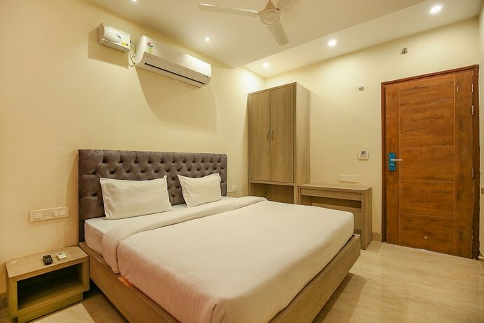 Imagen de la habitación del Hotel Fabhotel Melano. Foto 19