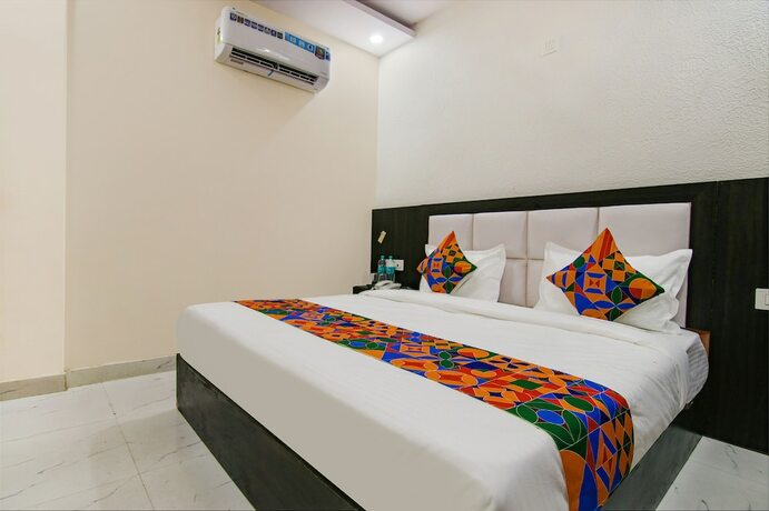 Imagen de la habitación del Hotel Fabhotel Palm Plaza. Foto 18