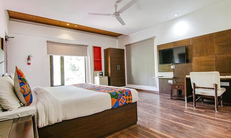 Imagen de la habitación del Hotel Fabhotel Paradise Ville Resort. Foto 10