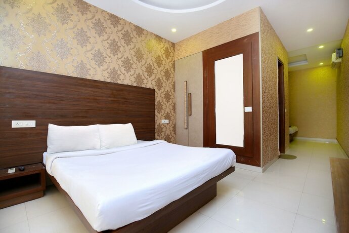 Imagen de la habitación del Hotel Fabhotel Pearl Grand. Foto 17