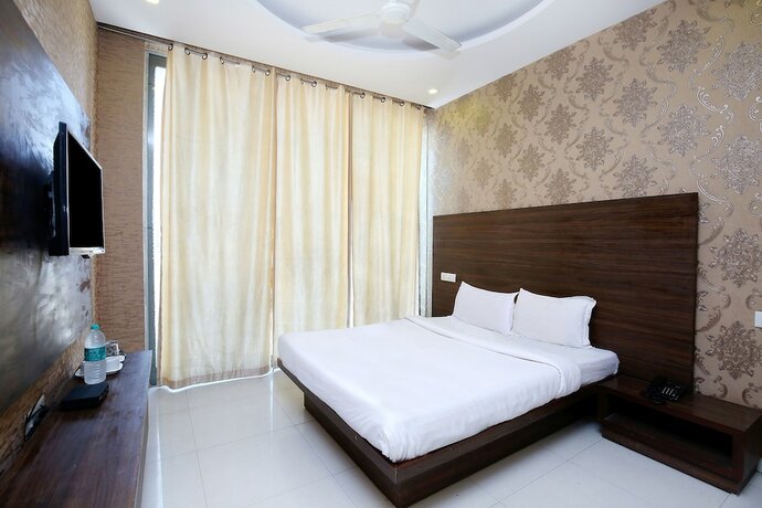 Imagen de la habitación del Hotel Fabhotel Pearl Grand. Foto 19