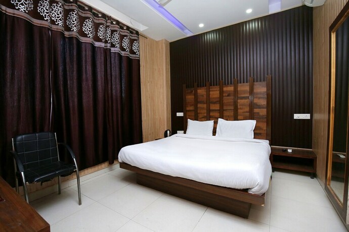 Imagen de la habitación del Hotel Fabhotel Pearl Grand. Foto 20