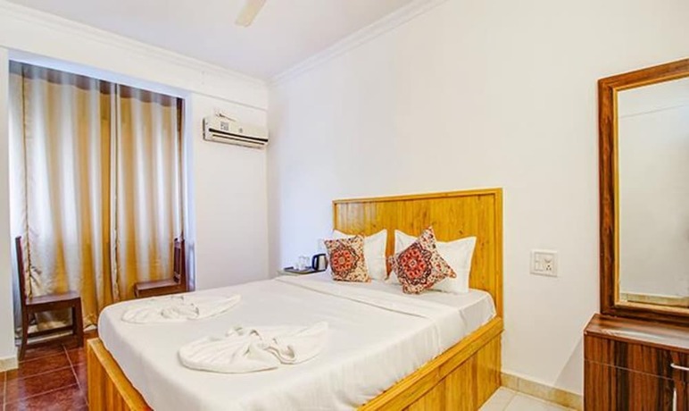 Imagen de la habitación del Hotel Fabhotel Pleasure Inn. Foto 18