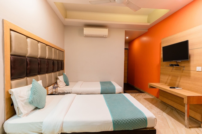 Imagen de la habitación del Hotel Fabhotel Prime Aroma Residency. Foto 10