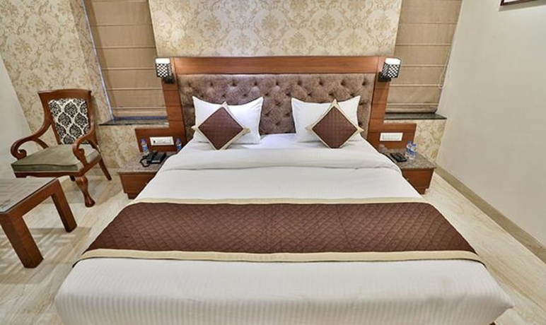 Imagen de la habitación del Hotel Fabhotel Prime Candle Wood. Foto 7