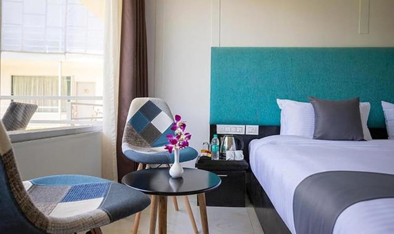 Imagen de la habitación del Hotel Fabhotel Prime Koko Maya By Stonewood. Foto 11