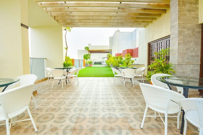 Imagen general del Hotel Fabhotel Prime Santoshi Holiday Homes. Foto 9