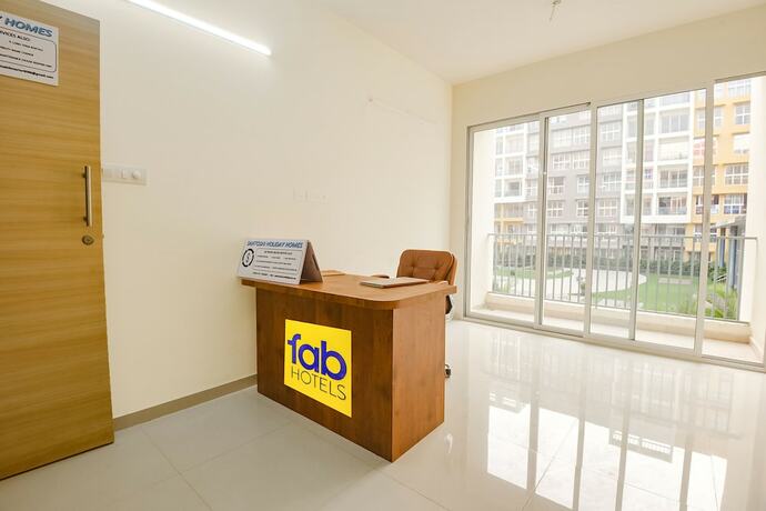 Imagen general del Hotel Fabhotel Prime Santoshi Holiday Homes. Foto 12