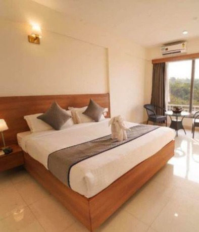 Imagen de la habitación del Hotel Fabhotel Prime Wayfarer. Foto 17