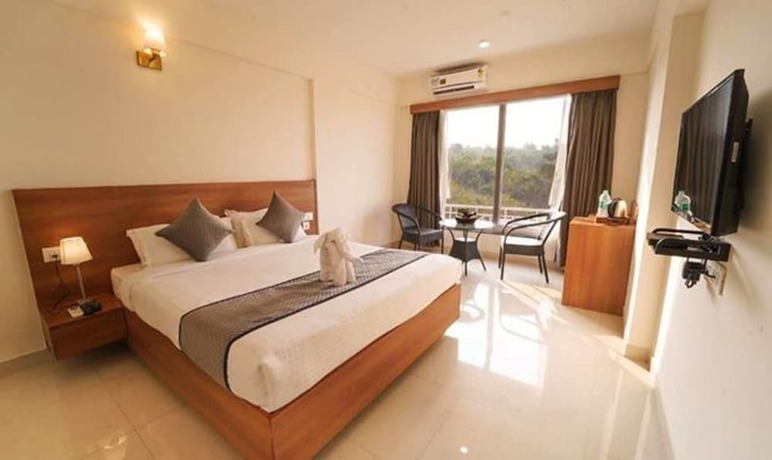 Imagen de la habitación del Hotel Fabhotel Prime Wayfarer. Foto 18
