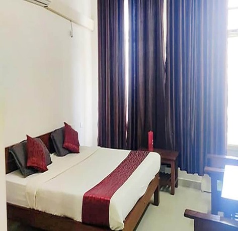 Imagen de la habitación del Hotel Fabhotel Raj Residency. Foto 14