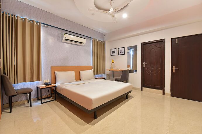 Imagen de la habitación del Hotel Fabhotel Rushank Palace. Foto 19