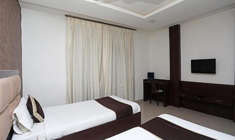 Imagen de la habitación del Hotel Fabhotel Taj Castle. Foto 9