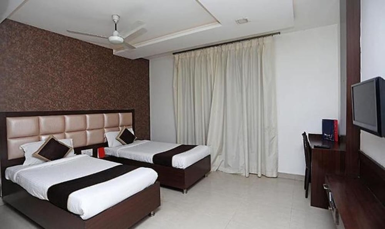 Imagen de la habitación del Hotel Fabhotel Taj Castle. Foto 13