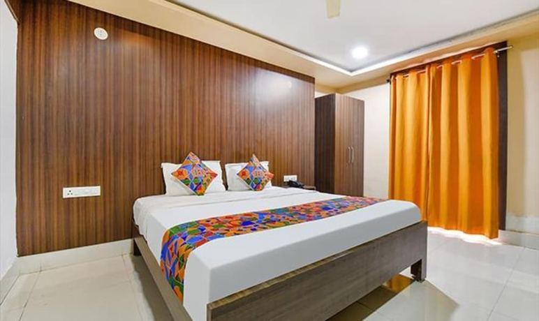 Imagen de la habitación del Hotel Fabhotel Tak International. Foto 4