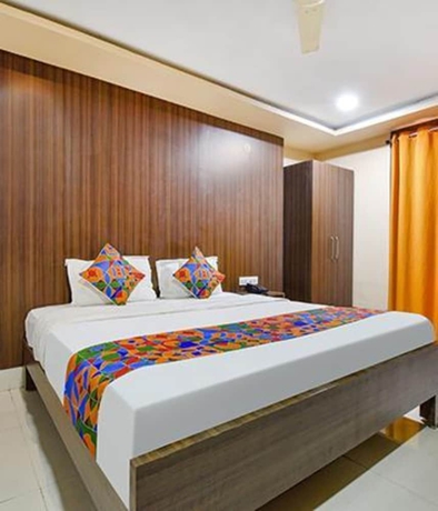 Imagen de la habitación del Hotel Fabhotel Tak International. Foto 11