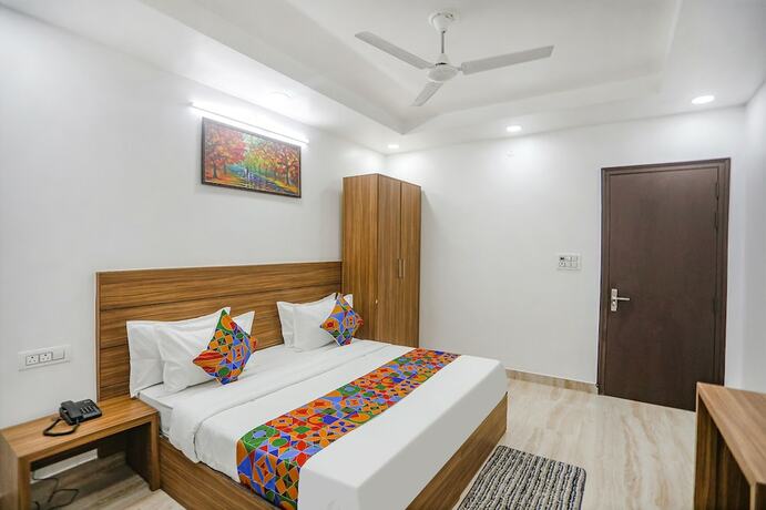 Imagen de la habitación del Hotel Fabhotel Unique Stay. Foto 18