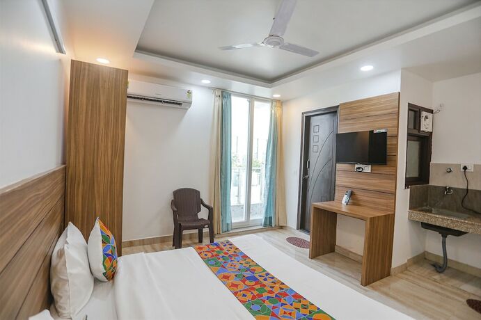 Imagen de la habitación del Hotel Fabhotel Unique Stay. Foto 19
