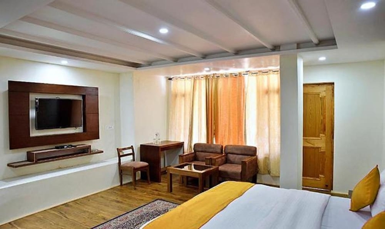 Imagen de la habitación del Hotel Fabhotel Whistling Winds. Foto 11
