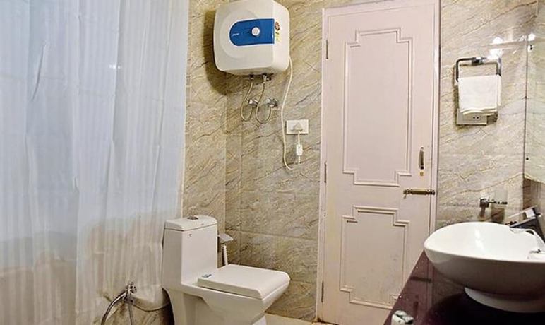 Imagen de la habitación del Hotel Fabhotel Whistling Winds. Foto 12