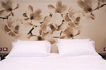 Imagen de la habitación del Hotel Fabio Massimo Design. Foto 6