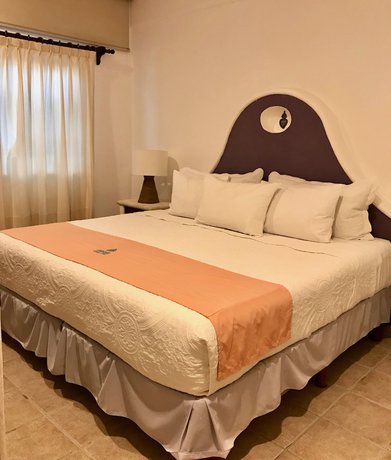 Imagen de la habitación del Hotel Fabiola Condo. Foto 17