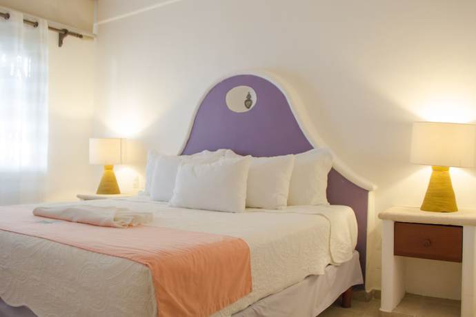 Imagen de la habitación del Hotel Fabiola Condo. Foto 18