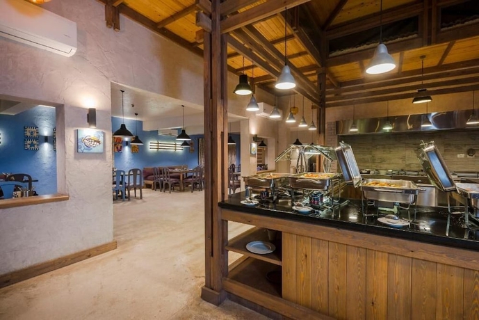 Imagen del bar/restaurante del Hotel Fade by La Hacienda Ras Sudr. Foto 3