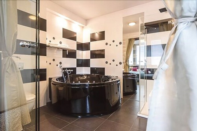 Imagen de la habitación del Hotel Fado Spa and Restaurant. Foto 18