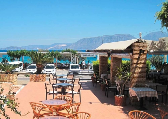 Imagen del bar/restaurante del Hotel Faedra Beach. Foto 8