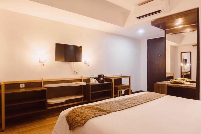 Imagen de la habitación del Hotel Fahira Bukittinggi Syariah. Foto 1